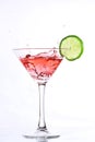 Red cocktail with lime on white Royalty Free Stock Photo