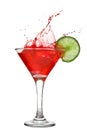 Red cocktail with splash and lime Royalty Free Stock Photo