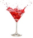 Red cocktail splashing in martini glass Royalty Free Stock Photo