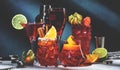 Red cocktails set: kir royale, negroni, boulevardier, cosmopolitan, sea breeze with fruits, berries and citrus. Bar tools. Dark Royalty Free Stock Photo