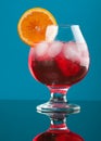 Red coctail drink with ice cubs Royalty Free Stock Photo