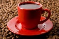 Red Coffee Cup and The Beans Royalty Free Stock Photo