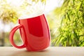 Red coffee cup empty front porch the morning