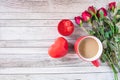 Red coffee cup with heart and rose Valentines Day concept