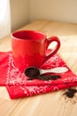 Red Coffee Mug with Napkin and Grounds Royalty Free Stock Photo