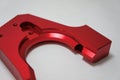 Red color anodized aluminum parts texture design. CNC parts.