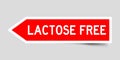 Red arrow sticker with word lactose free on gray background Royalty Free Stock Photo