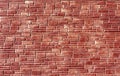 Red color brick stylized wall texture. Royalty Free Stock Photo