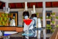 Red color cocktail in the glass at the bar counter