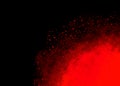 Red color dust particle explosion cloud on black background Royalty Free Stock Photo