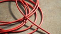 Red color electric power wire cable. Royalty Free Stock Photo