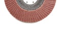 Red color flap abrasive disc. Royalty Free Stock Photo