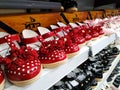 Red Color Girl Baby Shoes in a Shelf for Sale in a Mall. Interior design of a Foot Wear Department in Vishal Mall, Laggere