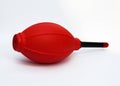 Red Color Hand Air Blower on white background. Rubber Air Blower Pump Dust Cleaner for Camera Royalty Free Stock Photo