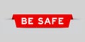 Red inserted label with word be safe on gray background