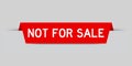 Red inserted label with word not for sale on gray background