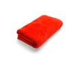 Red micro fiber towel on white background Royalty Free Stock Photo