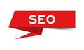 Red paper speech banner with word SEO Abbreviation of search engine optimization on white background