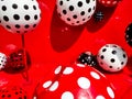 Red color place and ball with polkadot pattern