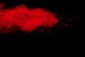 Red color powder explosion on black background Royalty Free Stock Photo