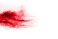 Red color powder explosion on white background. Royalty Free Stock Photo