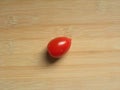 Red color ripe Grape tomato isolated