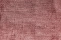 Red color weathered denim texture. Royalty Free Stock Photo