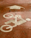 Bicycle with driver sign painted on the floor with arrow