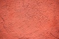 Red colored plaster wall background Royalty Free Stock Photo