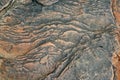 ROCK WITH SWIRLS AND RIDGES