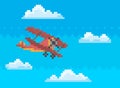 Red combat aircraft while flying among clouds. Lonely pixel helicopter for old game design