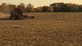 Red Combine Harvester in Soybean Field - Wide Angle View Royalty Free Stock Photo