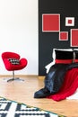 Red chair against white wall Royalty Free Stock Photo