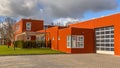 Red commercial building with warehouse Royalty Free Stock Photo