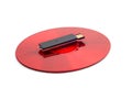 Red compact disc and black removable USB drive Royalty Free Stock Photo