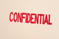 Red confidential stamp on a folder Royalty Free Stock Photo