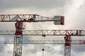 Construction cranes work at a construction site Royalty Free Stock Photo