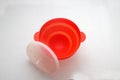 Collapsible red silicone container for microwave popcorn