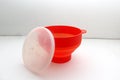 Collapsible red silicone container for microwave popcorn