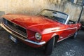 Red convertible Ford Mustang in Rome, Italy Royalty Free Stock Photo