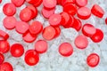 Red Coral Beads on Crystals of Bath Sea Salt for Spa as Summer background