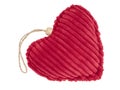 Red cord fabric heart shape pincushion isolated on white.