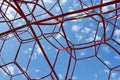 Red cords against the blue sky.