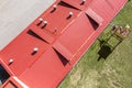 Red corrugated metal roof. aerial overhead view