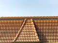 Red corrugated tile element of roof at house, Shingles roofing surface tiles overlay pattern Royalty Free Stock Photo