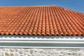 Vibrant Roof Design: Red Corrugated Tiles Enhancing Modern House Aesthetics