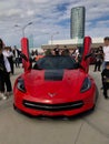 Red corvette c7 with butterfly doors