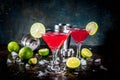 Red cosmopolitan cocktail with lime Royalty Free Stock Photo