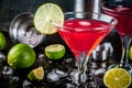 Red cosmopolitan cocktail with lime Royalty Free Stock Photo