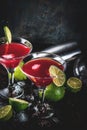 Red cosmopolitan cocktail with lime Royalty Free Stock Photo